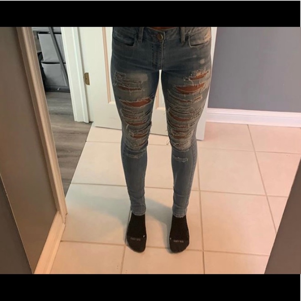 High waisted distressed jeans